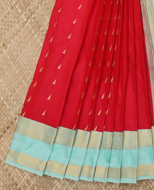 Red Budget Silk Saree Spotlighted with Triangle Zari Buttas, Complemented with a Contrast Traditional Zari Design Rettai Pettu Border, Gleaming Jaal Pallu, and Paired with a Contrast Blouse