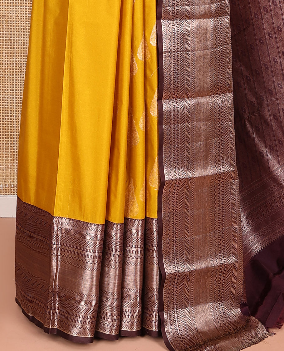 Yellow Budget Silk Saree, Ornamented with Zari Buttas All Over Its Body, Complemented by Contrast Border of Traditional Designs Woven in Zari, Gracefully Embellished Pallu, and Paired with a Contrast Blouse