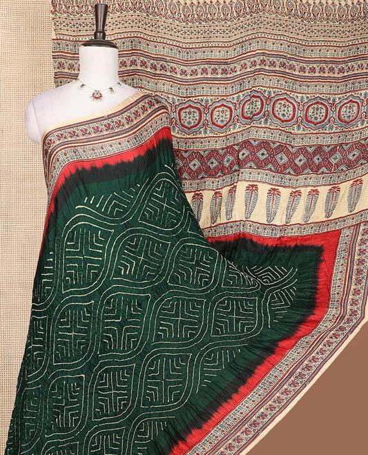 Green ogee theme bandhani dotted bandhani silk saree, contrast border, and pallu of intricate print