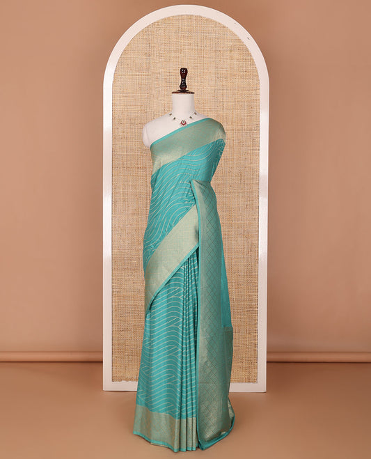 Green zig-zag striped fancy crepe saree, jaal design border & intricate pallu