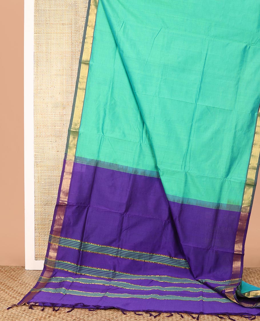 Green Plain Poly Cotton Saree, Complemented by a Contrast Zari Border, Pallu of Stripes, and Paired with a Contrast Blouse