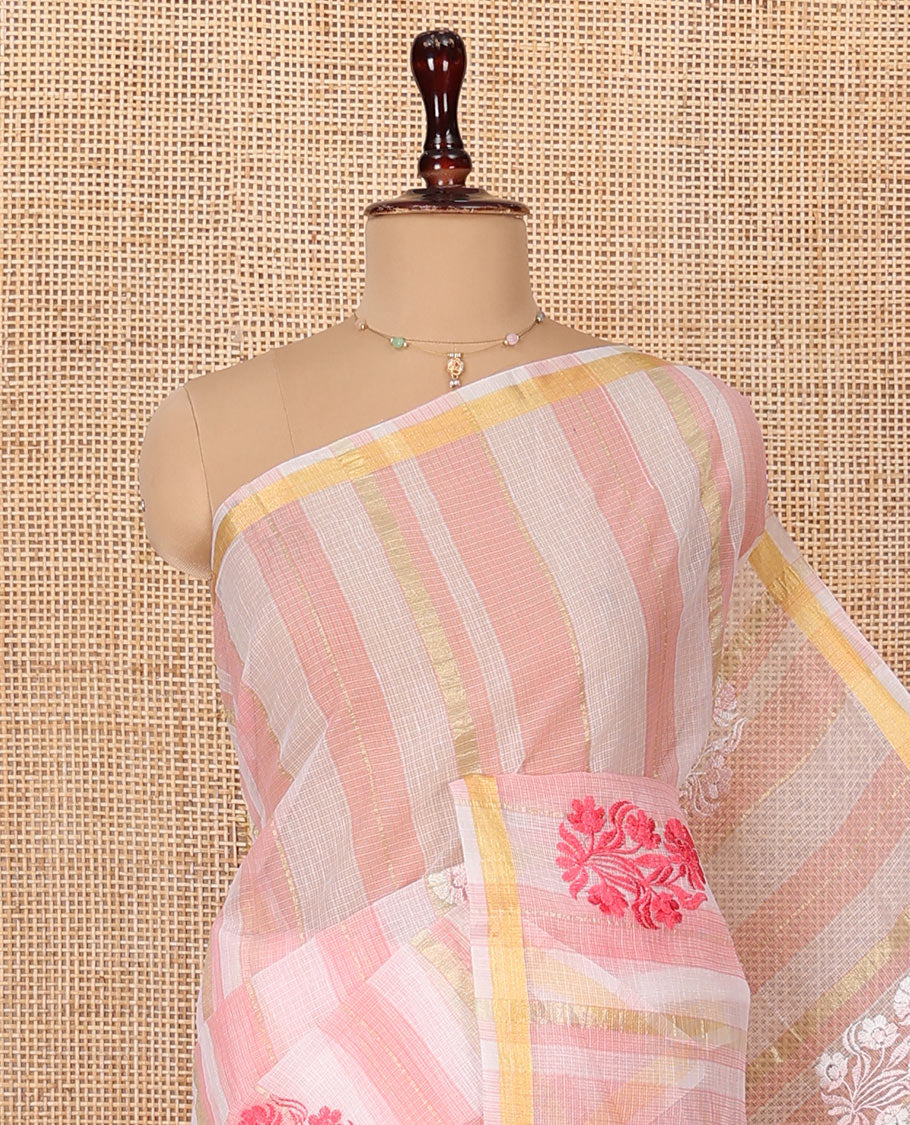 White and Pink Kota Cotton Saree, Mesmerized with Stripes and Floral Motifs Thread Embroidery on Its Body, Piping Border, Pallu Features Floral Embroidery, and Paired with a Matching Blouse