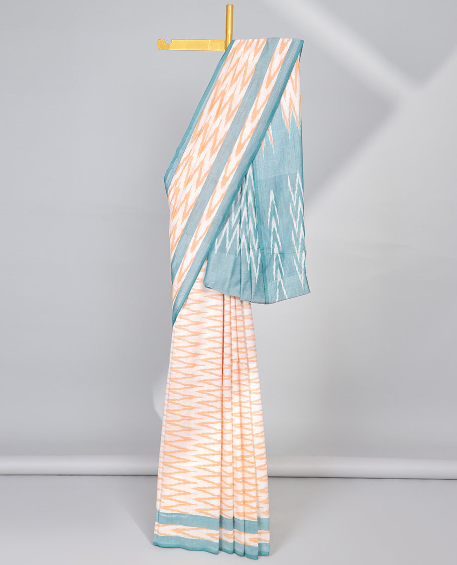 Cream geometric design ikkat cotton saree with contrast border & geometric design pallu