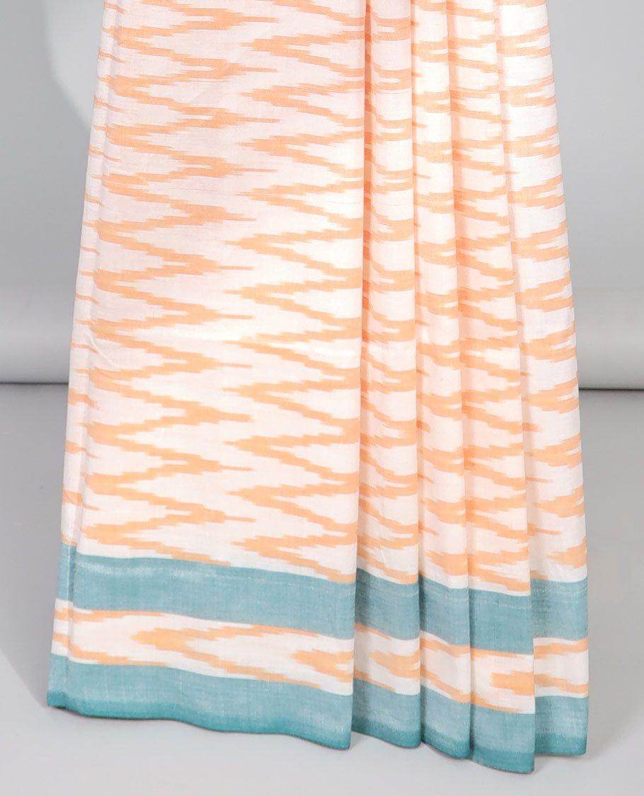 Cream geometric design ikkat cotton saree with contrast border & geometric design pallu
