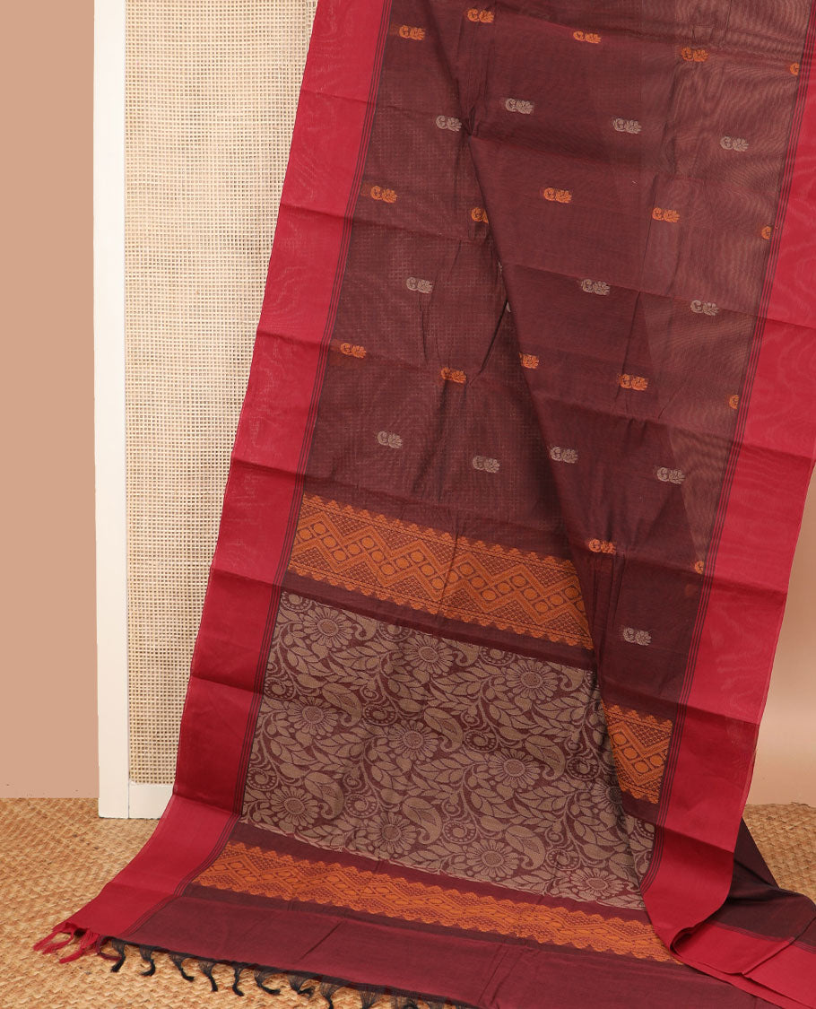 Brown buttas Kanchi cotton saree, contrast plain border, and pallu of floral and paisleys