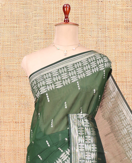 Green Semi-Silk Cotton Saree, Embellished with Buttas All Over Its Body, Highlighted by a Zari Border of Geometric Designs, Pallu of Geometric Designs, and Paired with a Matching Blouse