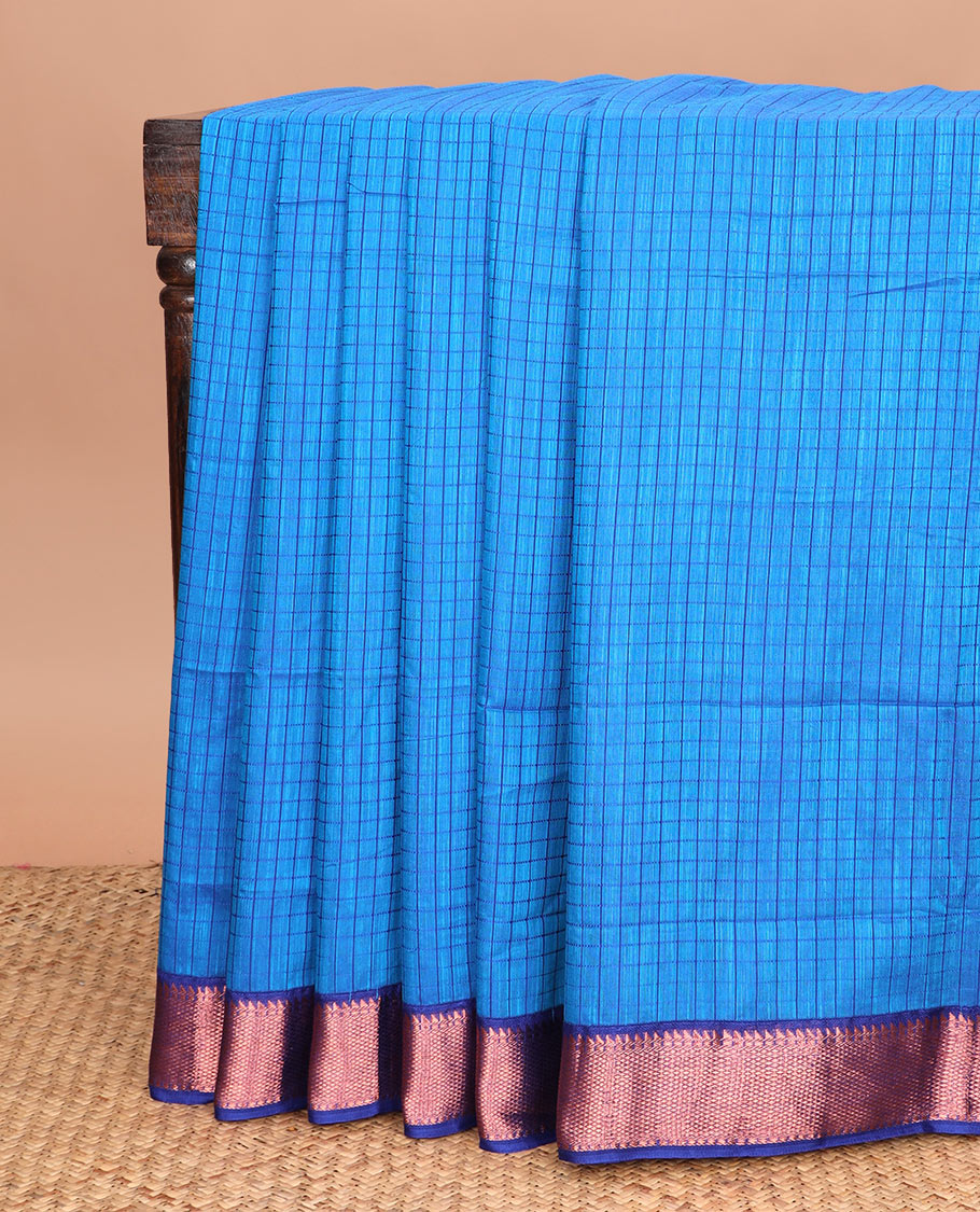 Blue micro checked chirala cotton saree, contrast traditional zari border, and zari design pallu