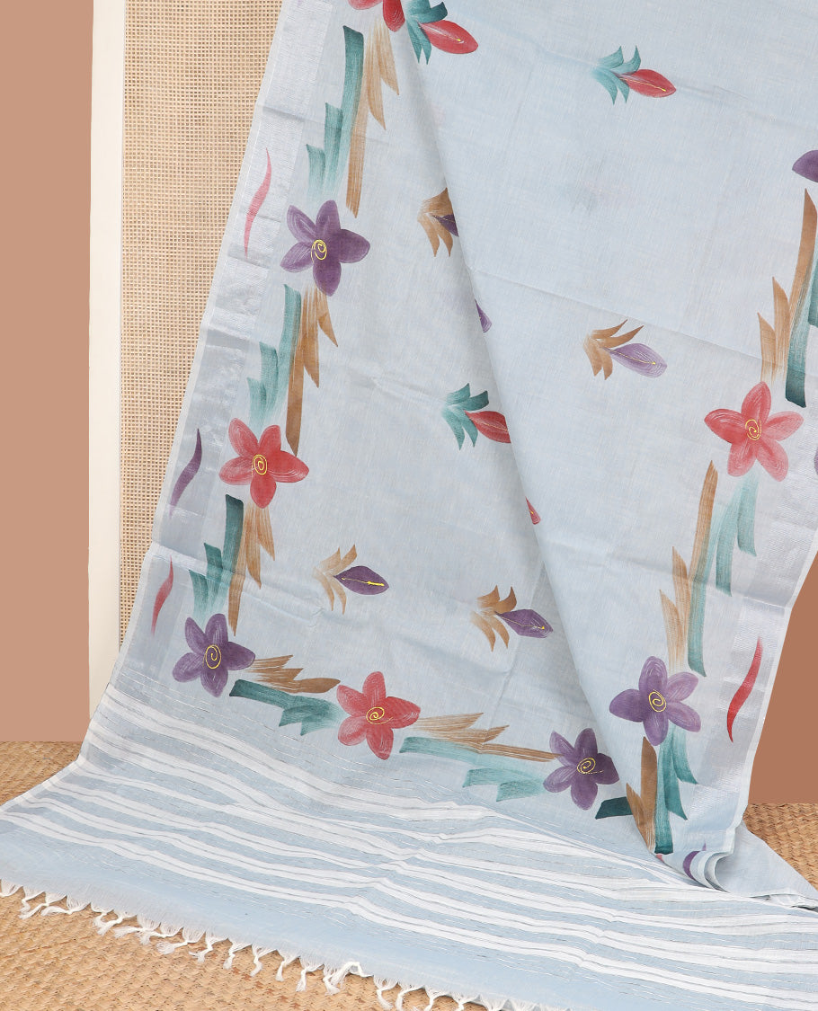 Pastel blue hand brushing style colorful floral printed jute cotton saree, zari with printed border, and striped pallu