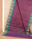Purple medium-sized checked Chettinad cotton saree, contrast temple border, and striped pallu