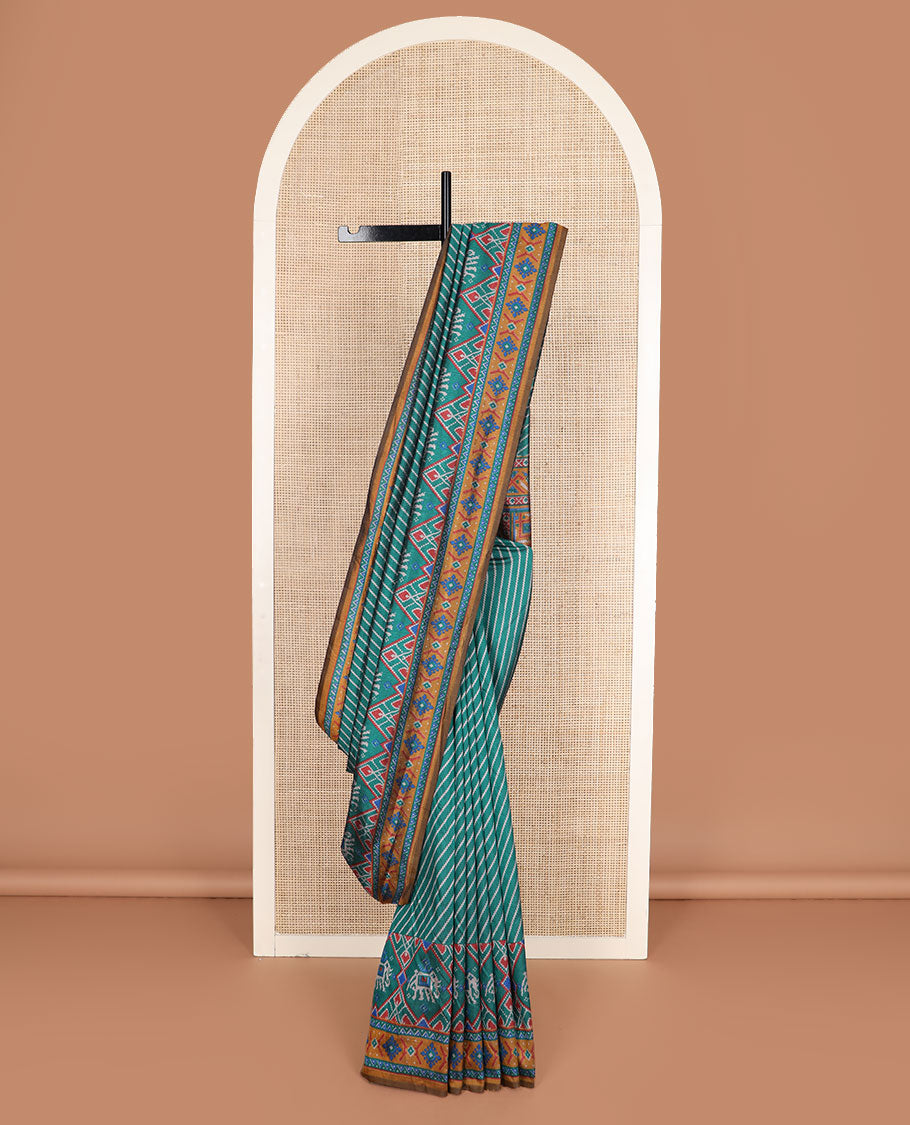 Green diagonal striped semi-banaras patola silk saree, contrast diamond and elephant motif border, and pallu of diamond design