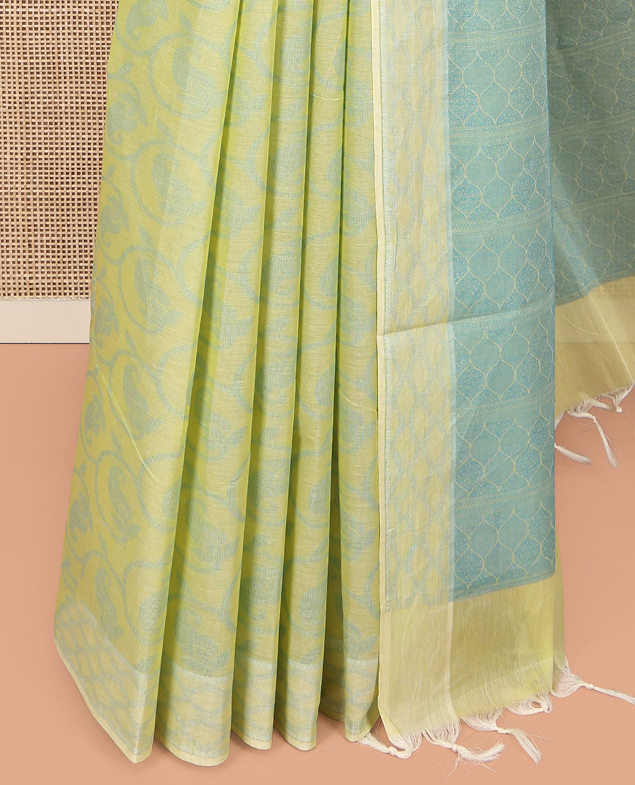Pale Green Coimbatore Cotton Saree, Sparsely Woven with Floral Creeper Design on Its Body, a Subtle Diamond Border, Pallu of Ogee Patterns, and Paired with Matching Blouse