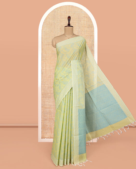 Pale Green Coimbatore Cotton Saree, Sparsely Woven with Floral Creeper Design on Its Body, a Subtle Diamond Border, Pallu of Ogee Patterns, and Paired with Matching Blouse