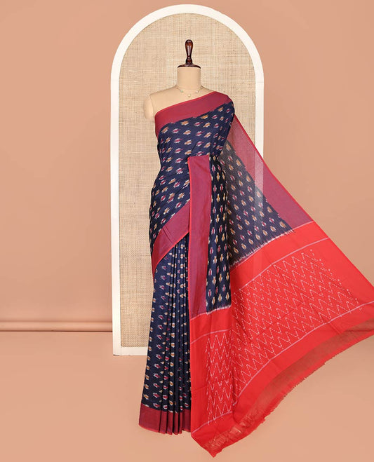 Blue Ikkat Cotton Saree, Embellished with Ikkat-Style Buttas on Its Body, Complemented by Contrast Plain Border, Pallu of Chevron Designs, and Has No Blouse
