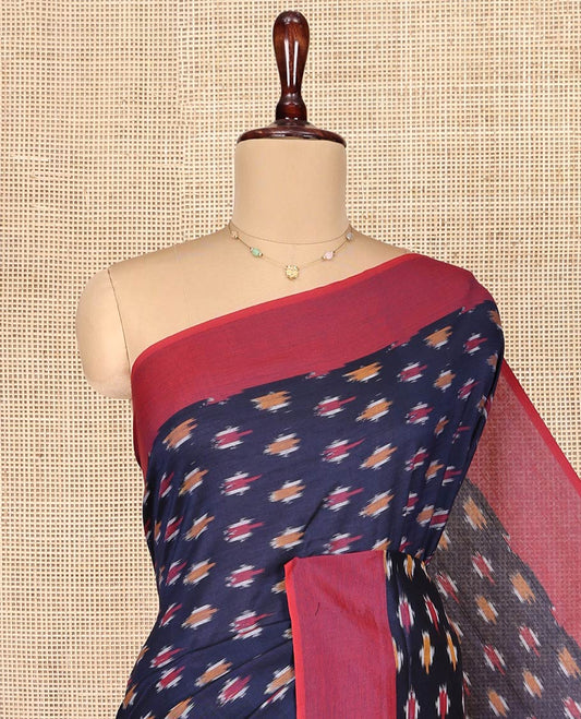 Blue Ikkat Cotton Saree, Embellished with Ikkat-Style Buttas on Its Body, Complemented by Contrast Plain Border, Pallu of Chevron Designs, and Has No Blouse