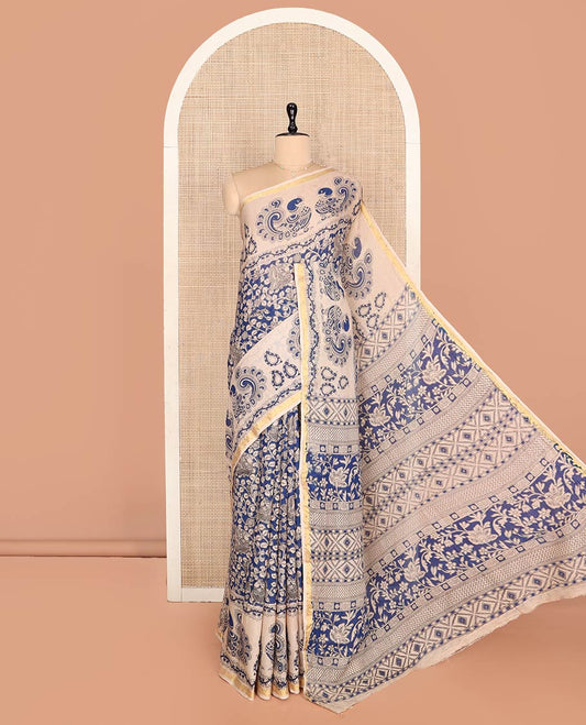 Blue Machine-Printed Kalamkari Cotton Saree Features Floral Vine and Peacock Motifs, a Piping Border, Pallu of Peacock, and a Matching Blouse