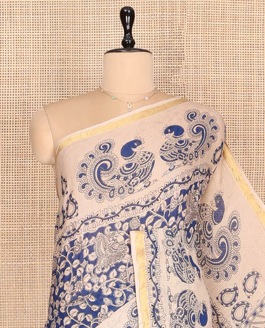 Blue Machine-Printed Kalamkari Cotton Saree Features Floral Vine and Peacock Motifs, a Piping Border, Pallu of Peacock, and a Matching Blouse