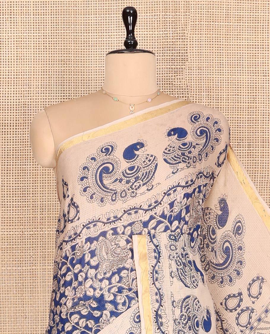 Blue Machine-Printed Kalamkari Cotton Saree Features Floral Vine and Peacock Motifs, a Piping Border, Pallu of Peacock, and a Matching Blouse