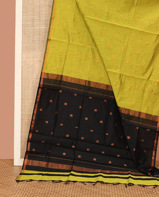 Green Maheshwari Cotton Saree, Sparkled with Flower Buttas All Over Its Body, Subtly Woven Piping Border, Captivating Contrast Pallu Steeped with Buttas, and Paired with a Contrast Blouse