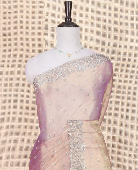 Lavender Designer Saree, Dazzled with Stone Embroidered Buttas on Its Body, Highlighted by a Scallop Stone Work Border, Pallu of Stone Embroidered Buttas, and Paired with a Matching Blouse