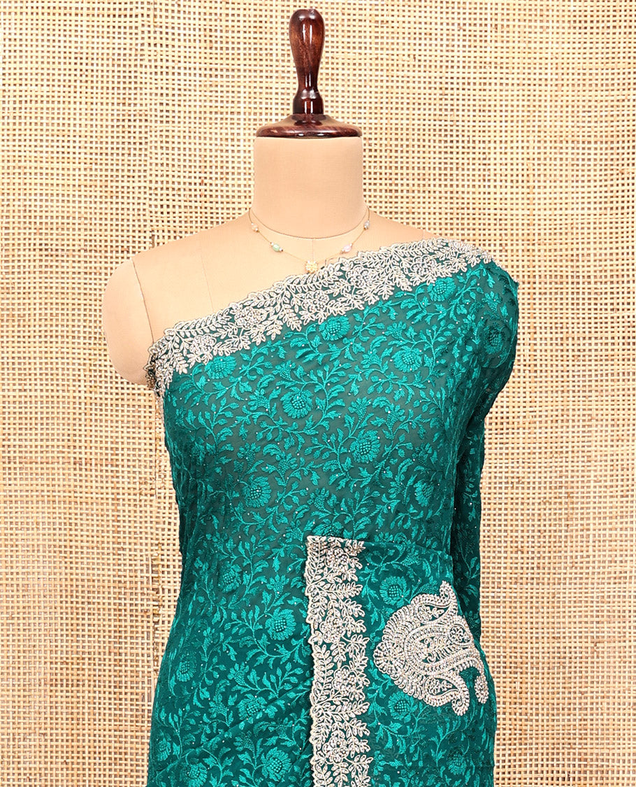 Green Designer Saree, Spotlighted with Floral Vine Embroidery, a Scallop Embroidered Border, and a Matching Blouse