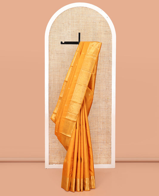 Yellow Kanchipuram Silk Saree, Sparsely Woven with Zari Buttas and Muthu Stripes, a Zari Border of Thilakam Mokku, Muthu, Iruthalai Pakshi, Manga, and Mayil Kann, Jaal Pallu, Matching Blouse