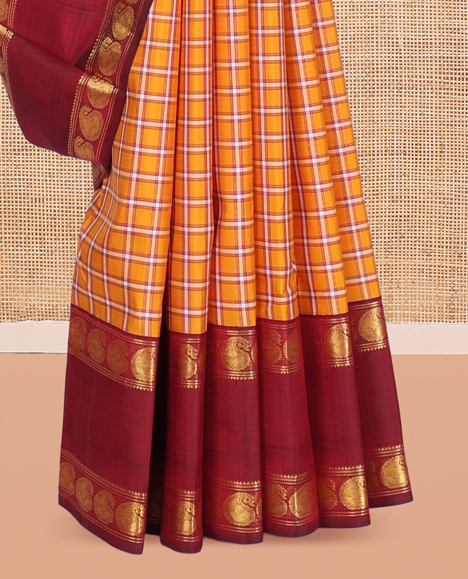 Orange Checked Kanchipuram Silk Saree, Complemented by a Contrast Rettai Pettu Manga Border, Zari Woven Pallu, and Contrast Blouse