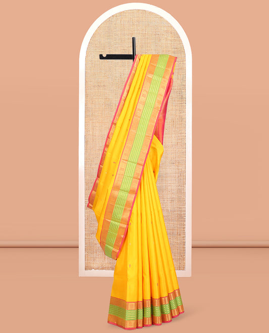 Orange Kanchipuram Silk Saree, Crafted with Thread Buttas, Complemented by Contrast Traditional Zari Border, Grand Pallu, and Contrast Blouse