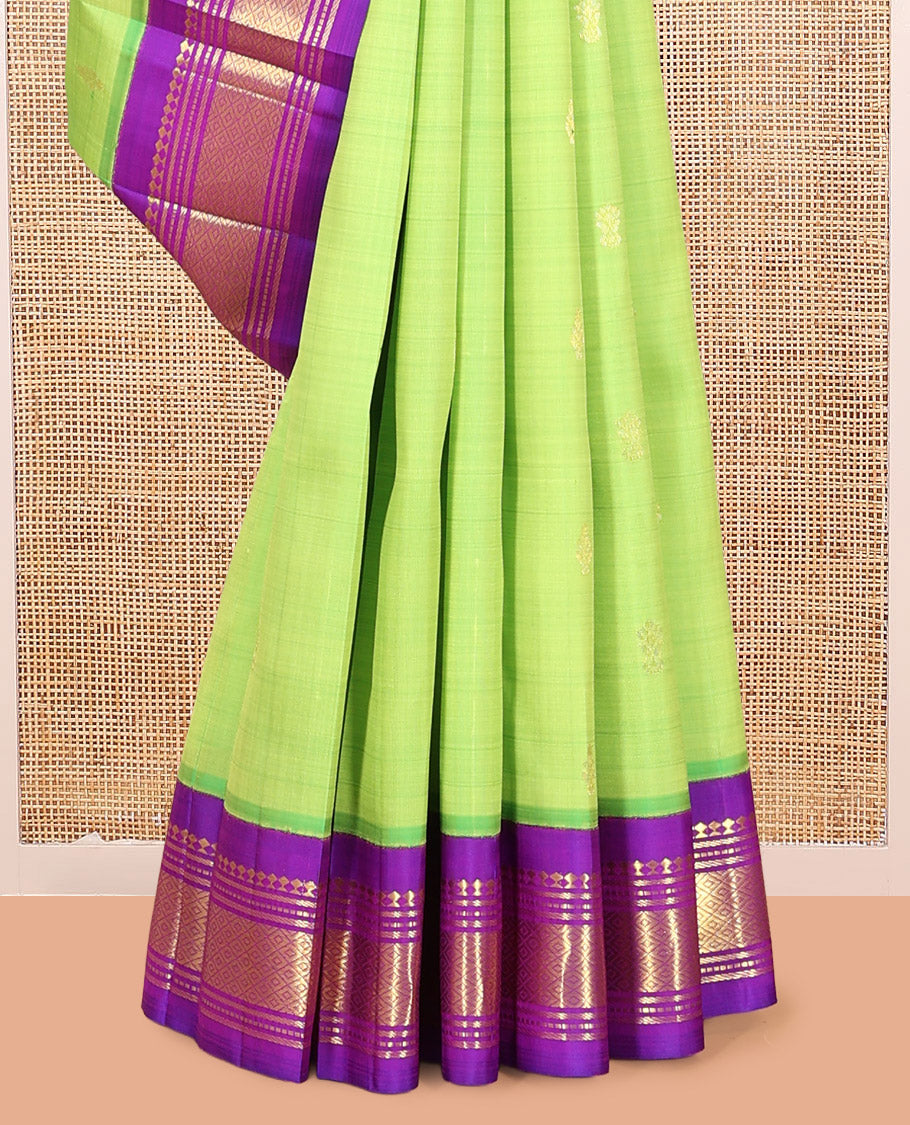 Green Kanchipuram Silk Saree, Delicately Woven with Zari Buttas, Complemented by a Contrast Korvai Border of Panner Sombu, Banaras, Muthu, and Mayil Kann Design, Pallu of Zari Design, and No Blouse