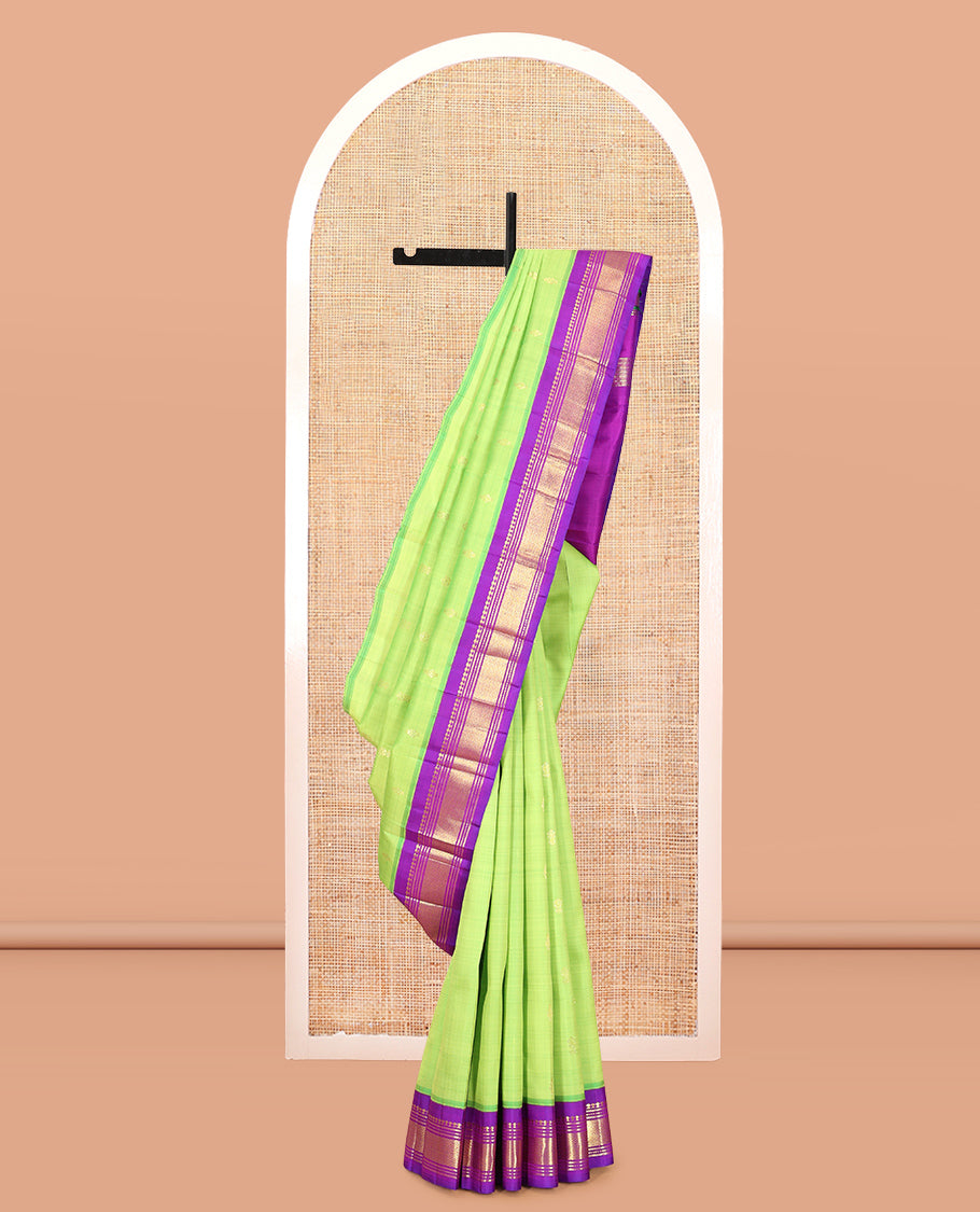 Green Kanchipuram Silk Saree, Delicately Woven with Zari Buttas, Complemented by a Contrast Korvai Border of Panner Sombu, Banaras, Muthu, and Mayil Kann Design, Pallu of Zari Design, and No Blouse