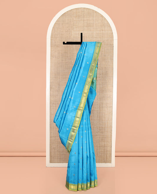 Blue Kanchipuram Silk Saree, Woven with Zari Buttas, Complemented by Contrast One-Sided Border of Rekku, and Mayil Kann Designs, Zari Design Pallu, and No Blouse