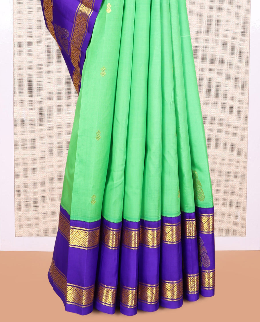 Green Kanchipuram Silk Saree, Woven with Zari Buttas, a Contrast One-sided Korvai Border of Diamond, and Mayil Designs, Pallu of Floral and Paisleys, and No Blouse