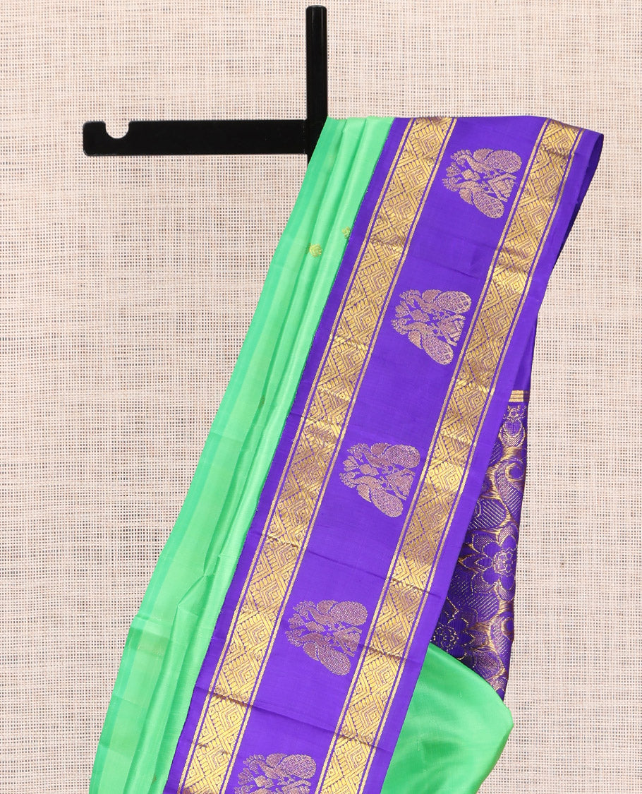 Green Kanchipuram Silk Saree, Woven with Zari Buttas, a Contrast One-sided Korvai Border of Diamond, and Mayil Designs, Pallu of Floral and Paisleys, and No Blouse