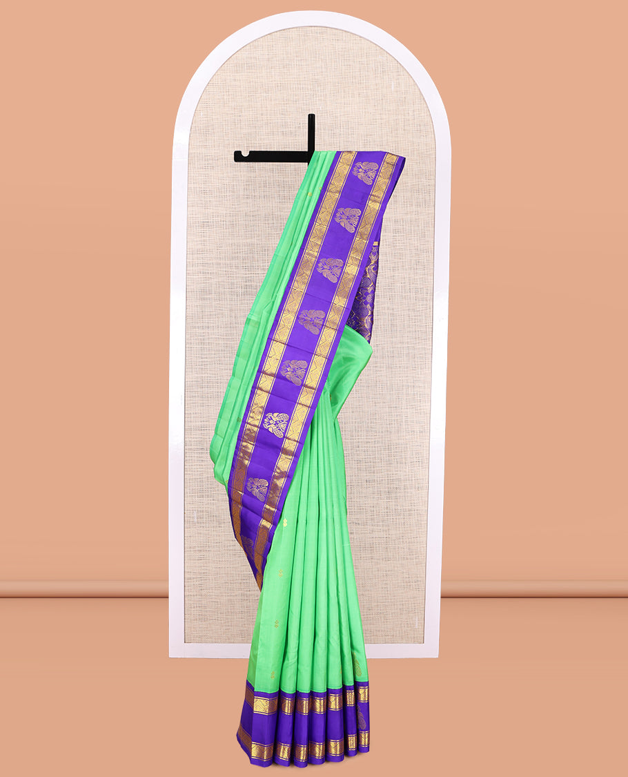 Green Kanchipuram Silk Saree, Woven with Zari Buttas, a Contrast One-sided Korvai Border of Diamond, and Mayil Designs, Pallu of Floral and Paisleys, and No Blouse