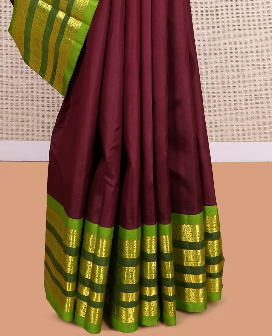 Maroon Kanchipuram Silk Saree, Graced with Zari Buttas, a Contrast Korvai One-Sided Border of Rekku, Rudraksham, Neli, and Mayil Design, Zari Design Pallu, and No Blouse