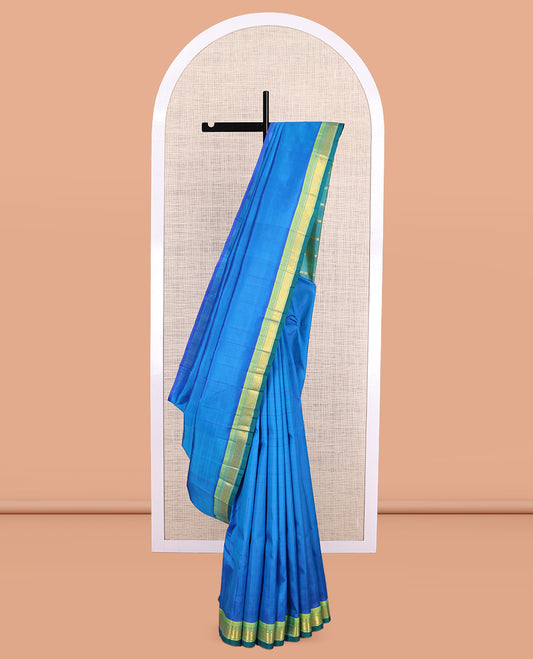 Blue Plain Kanchipuram Silk Saree, a Contrast One-Sided Border of Rekku, Banaras, and Jaal Designs, Zari Design Pallu, and No Blouse