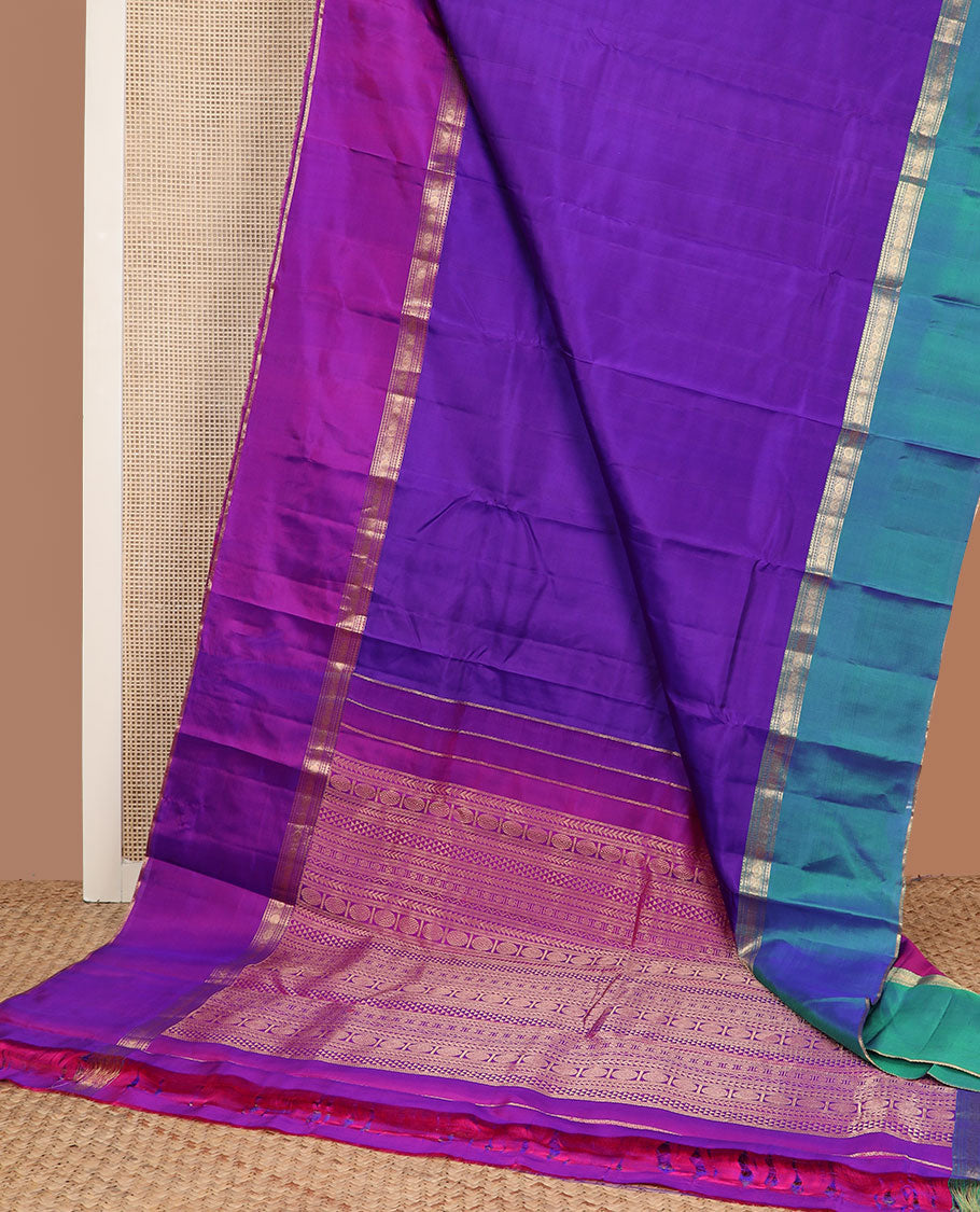 Blue plain Kanchipuram silk saree, contrast rettai pettu traditional zari border & pallu of kathir,neli, rudraksham,ara maadam, ara bogudi, banaras & lavangam