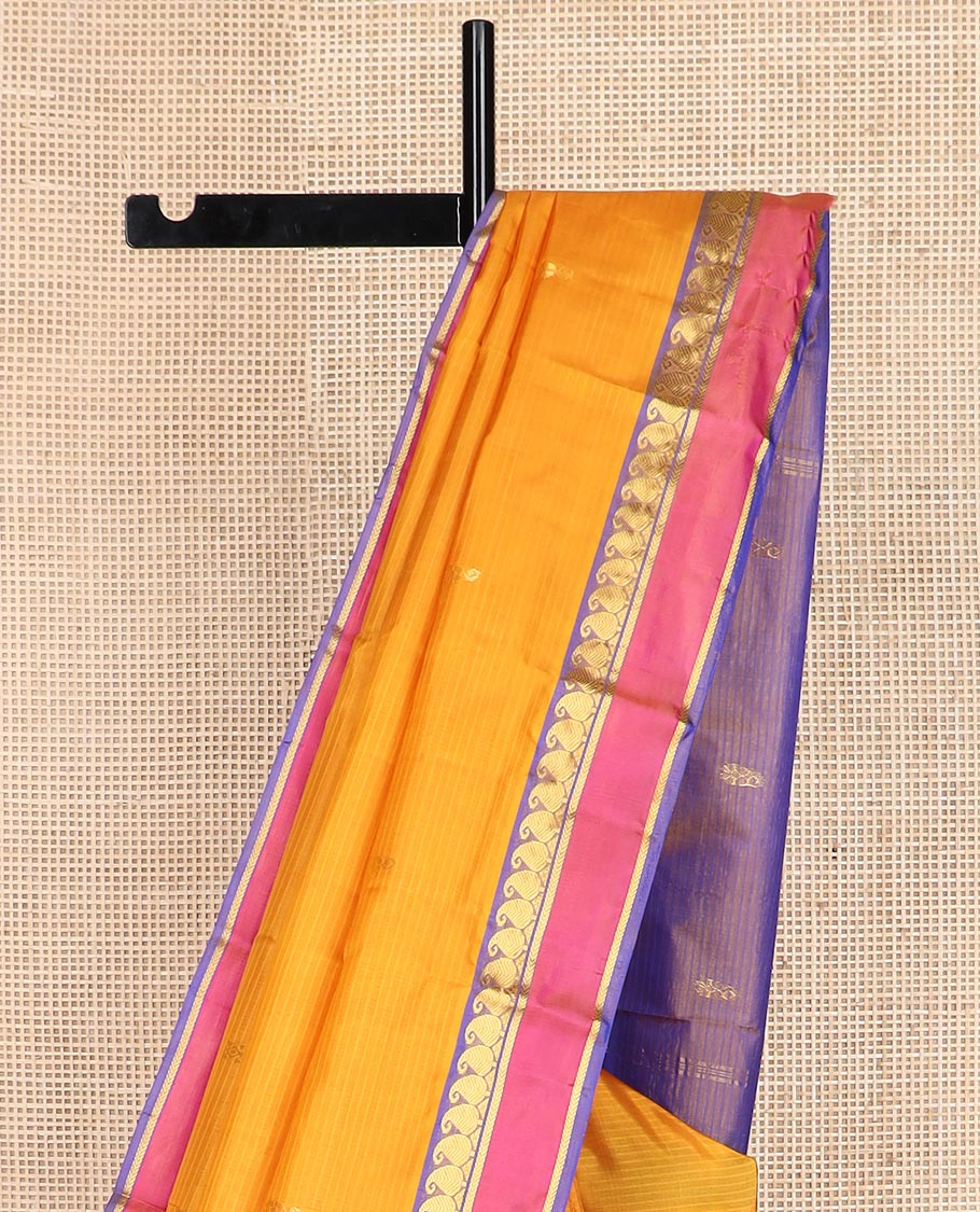 Yellow striped and buttas Kanchipuram silk saree, contrast rettai pettu border of vanki manga, and kathir designs, and zari design pallu