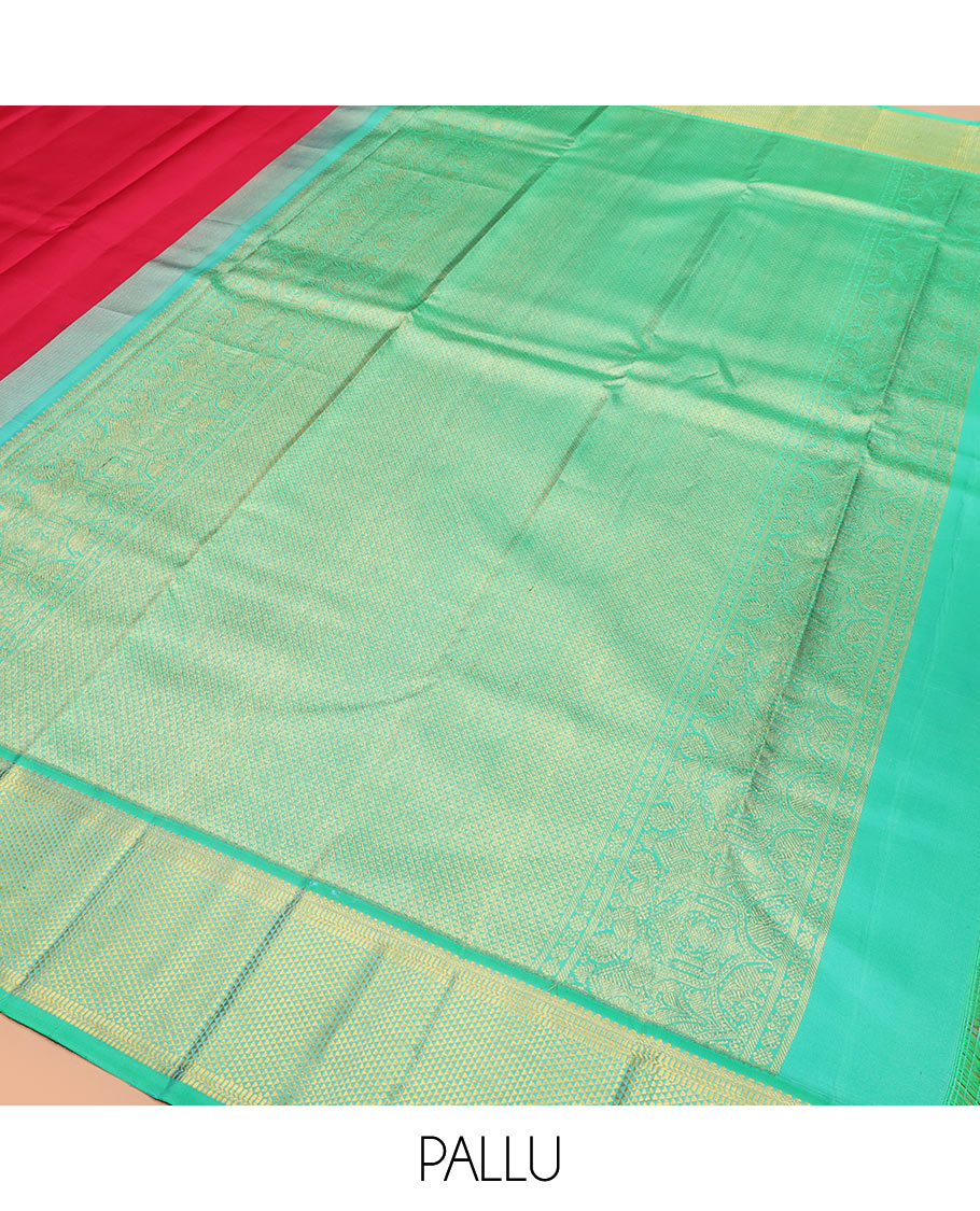 Red plain Kanchipuram silk saree, contrast border of thilakam mokku, muthu, banaras, and ara maadam designs, and ara maadam design pallu