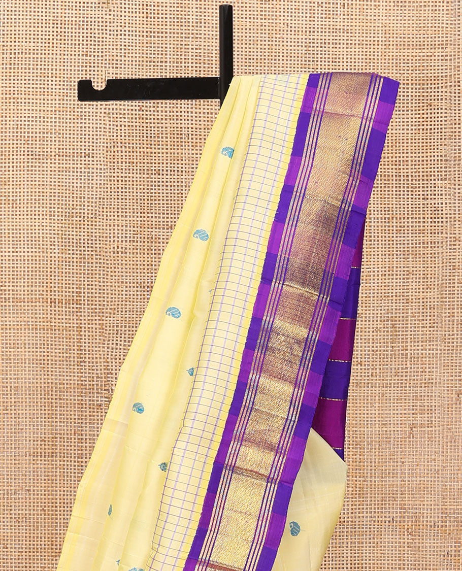 Pale yellow thread buttas Kanchipuram silk saree, contrast korvai one-sided border of banaras & mayil kann & zari design pallu