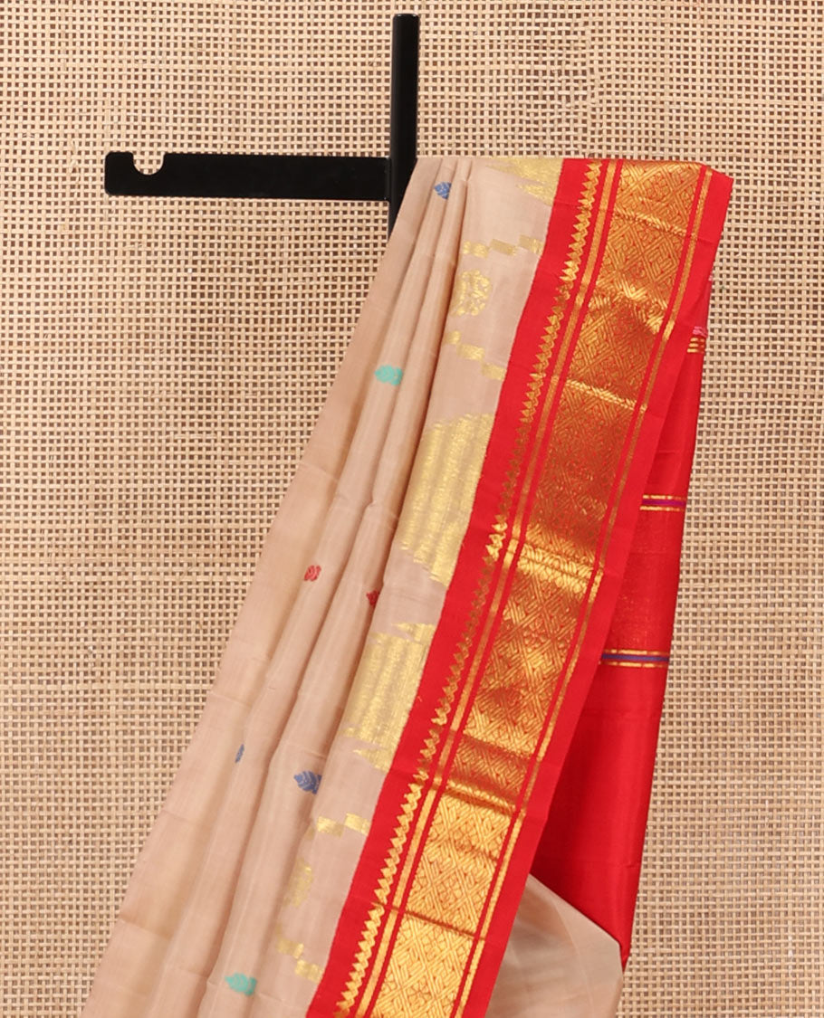 Sandal zari and thread buttas Kanchipuram silk saree, contrast one-sided korvai border of thikalam mokku, and jaal, and thazampoo rekku pallu