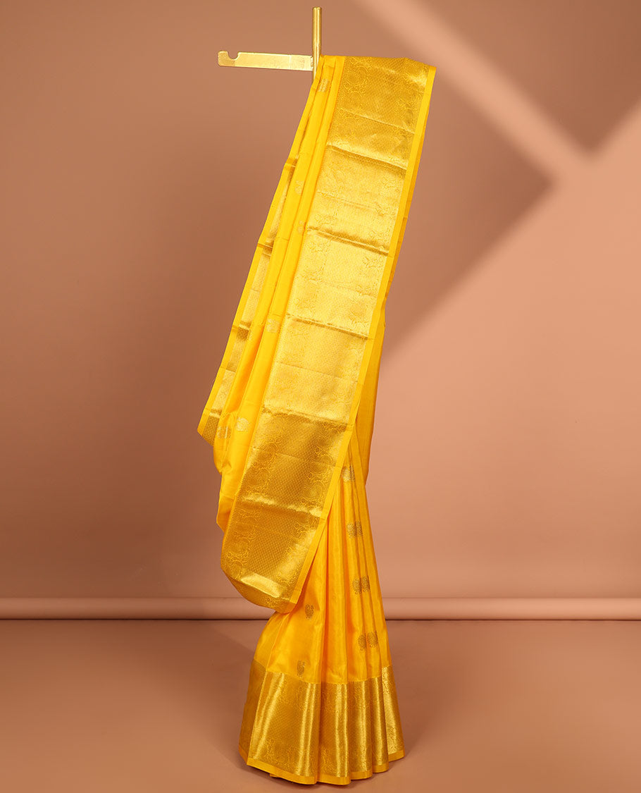 Yellow buttas kancheepuram silk saree with self intricate zari border & traditional zari design pallu