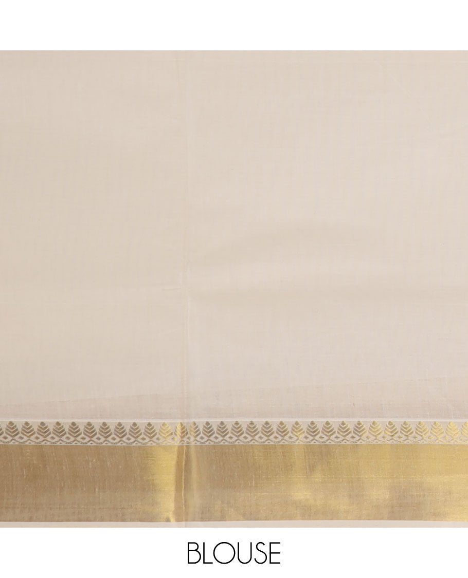 Cream zari buttas Kerala saree, zari border, and pallu of tree designs in zari