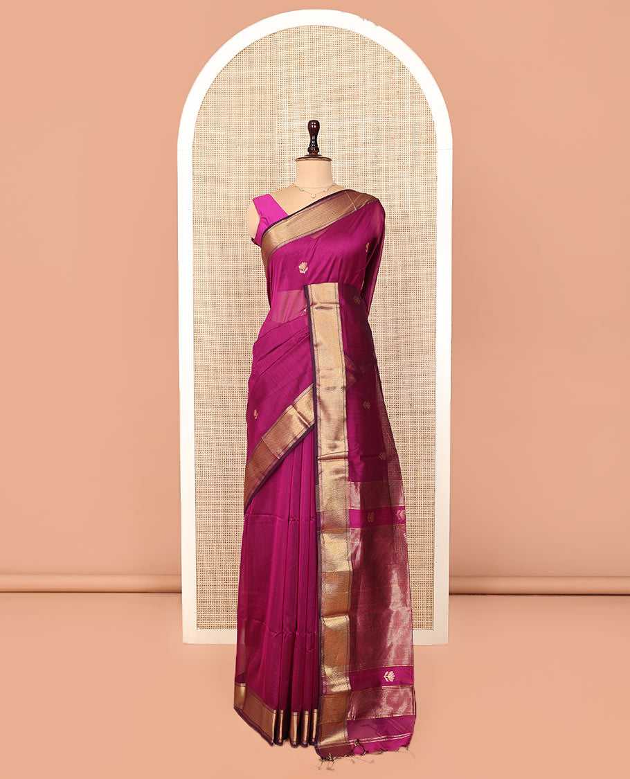 Purple Maheshwari Cotton Saree, Charmingly Accented with Floral Buttas All Over Its Body, Highlighted by  Traditional Zari Border, Pallu Steeped with Gleaming Zari Stripes, and Paired with a Matching Blouse