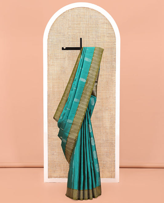 Green Mayuri Soft Silk Saree, Elevated with Zari Buttas All Over Its Body, Complemented by Contrast Border of Intricate Designs, Grand Pallu and Paired with a Contrast Blouse