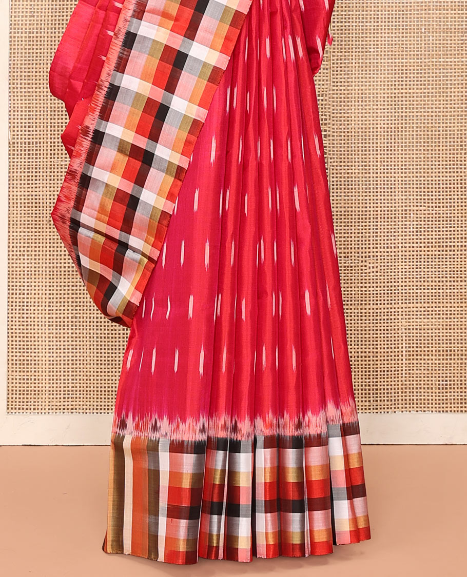 Red Mayuri Soft Silk Saree, Mesmerized with Ikkat Buttas All Over Its Body, Complemented by Contrast Checked Border, Artfully Ikkat Textures Woven Pallu, and Paired with a Contrast Blouse