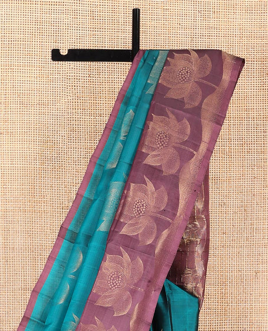 Blue Mayuri Soft Silk Saree, Graced with Floral Buttas, Complemented by Contrast Border of Floral Designs, Pallu of Geometric Designs, and Paired with Contrast Blouse