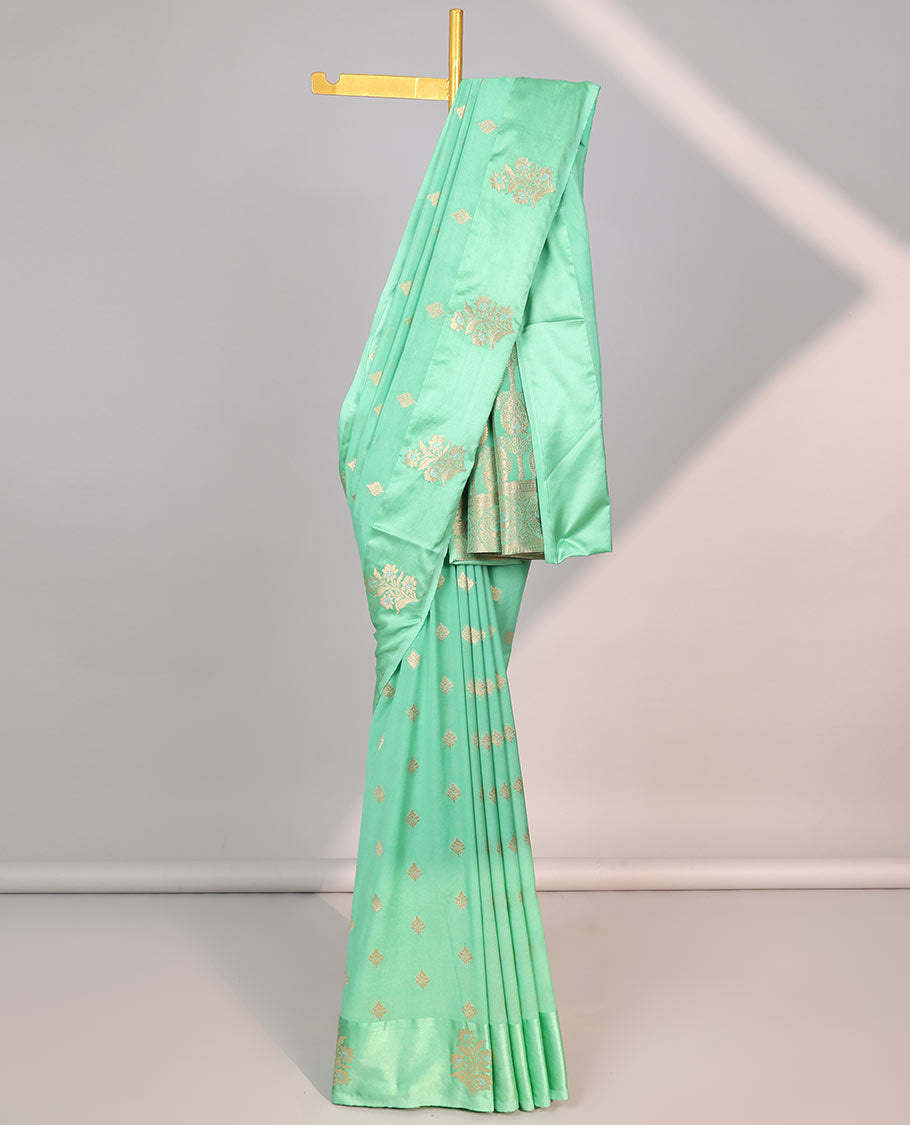 Green leaf motifs mushru silk saree with self floral design border & pallu of intricate zari design