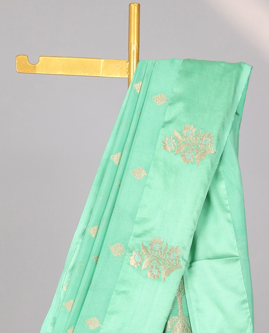 Green leaf motifs mushru silk saree with self floral design border & pallu of intricate zari design