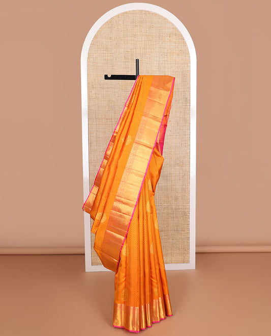 Orange floral jaal design silk saree with contrast border of rekku, muthu, manga, banaras design & zari design pallu