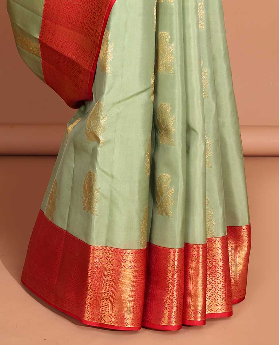 Green floral buttas vasundhara elite silk saree with contrast zari design border & pallu of intricate zari design